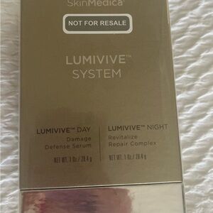 SkinMedica LUMIVIVE System with Gold and Silver Packaging.